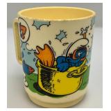 Vintage Collectible Cups Including Smurfs, Yogi bear And More Vintage Collectible Cups Including Smurfs, Yogi bear And More