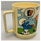 Vintage Collectible Cups Including Smurfs, Yogi bear And More Vintage Collectible Cups Including Smurfs, Yogi bear And More