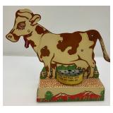 Vintage Tin Litho Mooing Cow Mechanical Pull Tail Toy (Voice Box Needs Work) 9" L x 8 b1/2" H x 3" W Vintage Tin Litho Mooing Cow Mechanical Pull Tail Toy (Voice Box Needs Work) 9" L x 8 b1/2" H x 3" W