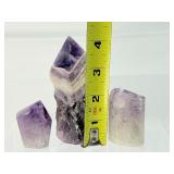 Amethyst lot including a 297 gm/10.4 oz. heart, a 131 gm/4.6 oz. heart, 296 gm/10.4 oz. rough Chevron tower, 125 gm/4.4 oz amethyst core and a 61 gm/2.2 oz polished point