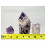 Amethyst lot including a 297 gm/10.4 oz. heart, a 131 gm/4.6 oz. heart, 296 gm/10.4 oz. rough Chevron tower, 125 gm/4.4 oz amethyst core and a 61 gm/2.2 oz polished point