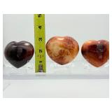 Carnelian Lot of 3 polished hearts: large puffy heart 263 gm./9.3 oz., darker heart 158 gm./4.2 oz., heart 149 gm./5.3 oz.