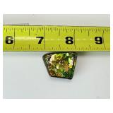 Ammolite (Korite): 10 gm./.4 oz. Comes in its own box with Certificate of Authenticity. Discovered in Alberta, Canada and is over 70 million years old
