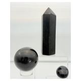 Black Tourmaline Polished Lot of 3: Generator 547 gm./1 lb. 10 oz., palmstone 52 gm./1.9 oz., sphere 60mm 375 gm./13.2 oz.