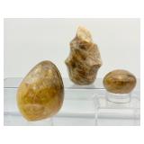 Golden Healer (yellow hematoid quartz): 3-piece lot: flame 401 gm./14.1 oz., freeform 317 gm./11.2 oz. and palmstone 96 gm./3.4 oz.