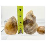 Golden Healer (yellow hematoid quartz): 3-piece lot: flame 401 gm./14.1 oz., freeform 317 gm./11.2 oz. and palmstone 96 gm./3.4 oz.