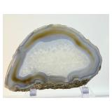 Agate Polished lot of 3: Agates Polished Lot of 3: large agate slice 683 gm/1 lb. 8.1 oz., two standing one polished side agates 573 gm./1 lb.4.2 oz. and 517 gm./ l.lb. 2.2 oz.