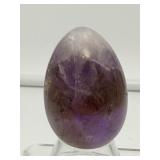 Super 7 (Melody Stone) and Ametrine lot of 3: Super 7 polished fan shaped piece 42 gm./1.5 oz, Super 7 palmstone 59 gm./2.1 oz., and Ametrine egg 59 gm./2.1 oz: