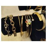 Assortment of Gold/Silver Tone Costume Bracelets Assortment of Gold/Silver Tone Costume Bracelets