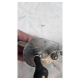 Direct Drive Shakespere Reel & 1977 Indiana Metal Craft Gun Belt Buckle