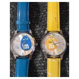 2 M&M Watches (Yellow and Blue)   Yellow band is broken