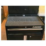 Husky® Rolling Tool Box with Peg Board Back and Built-In 125V/15A Power Cord with USB Ports 2-door/1-drawer Husky® Rolling Tool Box with Peg Board Back and Built-In 125V/15A Power Cord with USB Ports 2-door/1-drawer