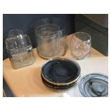 Lot of (16) Home Décor - Glass Vases (x7), 8" Decorative Plates (x9) Lot of (16) Home Décor - Glass Vases (x7), 8" Decorative Plates (x9)