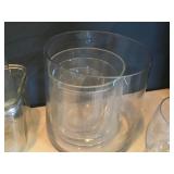 Lot of (16) Home Décor - Glass Vases (x7), 8" Decorative Plates (x9) Lot of (16) Home Décor - Glass Vases (x7), 8" Decorative Plates (x9)