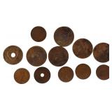 Old copper coins and currency from around the world, dating back to the early 1900s.