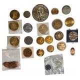 A large collection of tokens featuring people, places, and things from the past.