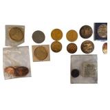 A large collection of tokens featuring people, places, and things from the past.