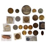 A large collection of tokens featuring people, places, and things from the past.