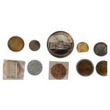 A large collection of tokens featuring people, places, and things from the past.