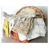 Vintage Lace Doilies and Table Linens Collection in Wicker Basket Vintage Lace Doilies and Table Linens Collection in Wicker Basket