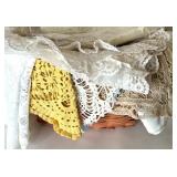 Vintage Lace Doilies and Table Linens Collection in Wicker Basket Vintage Lace Doilies and Table Linens Collection in Wicker Basket