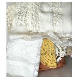 Vintage Lace Doilies and Table Linens Collection in Wicker Basket Vintage Lace Doilies and Table Linens Collection in Wicker Basket