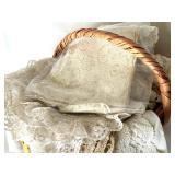 Vintage Lace Doilies and Table Linens Collection in Wicker Basket Vintage Lace Doilies and Table Linens Collection in Wicker Basket