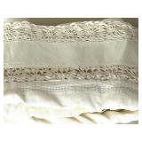 Vintage Lace Doilies and Table Linens Collection in Wicker Basket Vintage Lace Doilies and Table Linens Collection in Wicker Basket