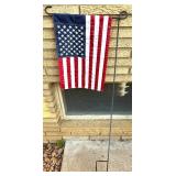 Outdoor Decor Lot with Doormat, Flag Stand, Planter, and Garden Spinner Outdoor Decor Lot with Doormat, Flag Stand, Planter, and Garden Spinner