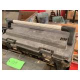 Black Plastic Toolbox With Assorted Tools and Accessories