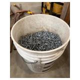 5 Gallon Bucket Nearly Full of Assorted Nails