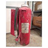 Older Fire Extinguisher with Hose and Nozzle