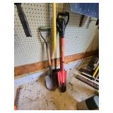 Assorted Shovels Located on Floor and Wall
