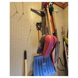 Assorted Shovels Located on Floor and Wall