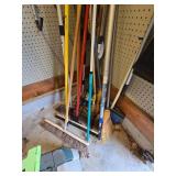 Contents of Corner, Brooms Saw, Cleaning Items