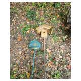 Birdhouse and Bird Feeder on Poles