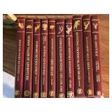 Assorted Hunting Books and Decorative Basket