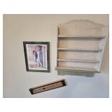Misc. Items on Wall, (2) Shelfs, Picture and Old Dolls Sign