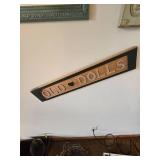 Misc. Items on Wall, (2) Shelfs, Picture and Old Dolls Sign