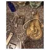 Assorted Home Decor Items and Vintage Bottle Openers