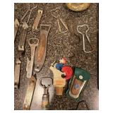 Assorted Home Decor Items and Vintage Bottle Openers