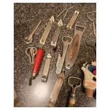 Assorted Home Decor Items and Vintage Bottle Openers