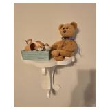Rocking Chair with Assorted Stuffed Animals, Wall Shelf with Contents