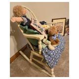Rocking Chair with Assorted Stuffed Animals, Wall Shelf with Contents