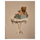Rocking Chair with Assorted Stuffed Animals, Wall Shelf with Contents