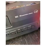 Sylvania VHS and Boxes of Various VHS Tapes to include Disney, John Wayne and much more