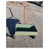 2 Lawn Seeders one Pull behind and one push  Use as is or for garden display/planter