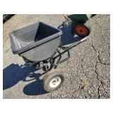 2 Lawn Seeders one Pull behind and one push  Use as is or for garden display/planter