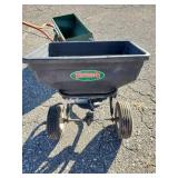 2 Lawn Seeders one Pull behind and one push  Use as is or for garden display/planter