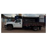 2007 White Chevy 3500 Diesel truck, flatbed with side rails, rack extending over the cab